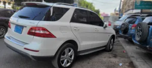 مرسديس ام ال 2012 فخامة وارد من امريكا صدمتها بسيطة كشافة وطرف الكور مجمرك مرتين جاهز من ولاية كالفو