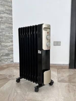 Midea electric heater -black and gold