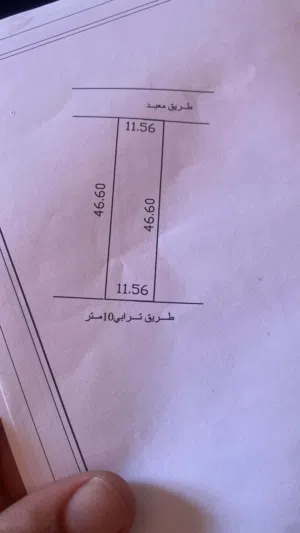 ارض للبيع في عين زارة 4شوراع علوي