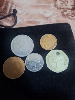 مجموعه من العملات المعدنية القديمه  قرشين ونص / ونصف قرش / وعشر قروش / وربع دينار  قرش الملك عبدالله
