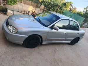 سيارة كيا سبيكترا 2003 لون فضي بمواصفات كوريا مع تأمين وسيدان مستعملة