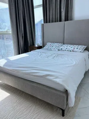 Anders King Bed is a fully upholstered unit constructed from engineered wood