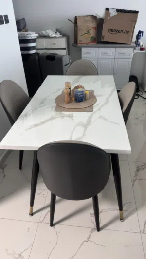 Marble top Dinning table with 4 Chairs for sale.