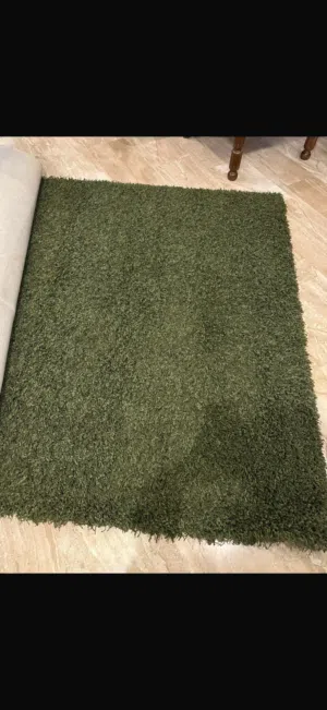 Dark green rug