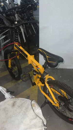 Yellow foldable mountain bike with gears