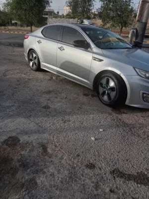 كيا K5 فحص ممتاز فل الفل بانوراما وارد كوري هايبرد للبيع بدفعه والباقي أقساط