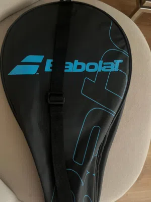 Padel racket with cover