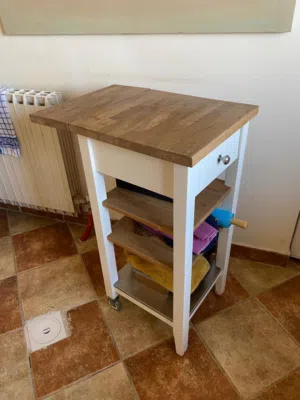 Mobile cabinet with cutting board drawers and shelves