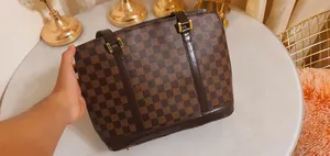 brown Louis Vuitton for sale  in Mafraq