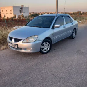 لانسر محرك 1600  بحاله ممتازه لا تحتاج اي صيانه اوتوماتيك