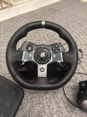 دركسون ألعاب + قير + دواسات Logitech G (بكامل ملحقاته)