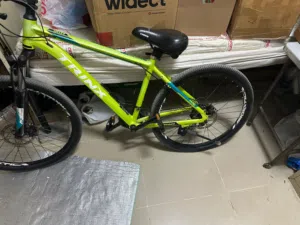 للبيع: دراجات جبلية من طراز Trinx M116 (أو M116 Pro) بإطار أخضر فسفوري لامع. تأتي بإطار من الألومنيو