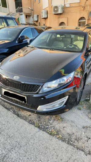 كيا اوبتيما 2014 هايبرد وارد الشركه فل بانوراما 2000cc فحص كامل 143 الف كم