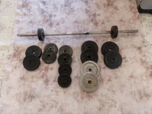 بار حديد مع اوزان حديد