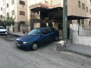 اوبل استرا 2003