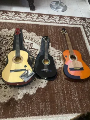 آلات موسيقيه جيتار وعود