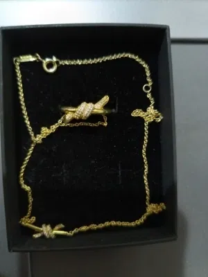 اكسسوارات ذهب عيار 18 مرصع الماس صناعي