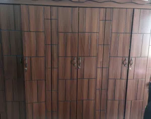A bedroom consisting of a 2 meter bed and a 6-door wardrobe and its hairstyle is in a very good cond