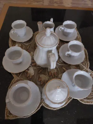 طاقم فناجين قهوه وطاقم نسكافيه.