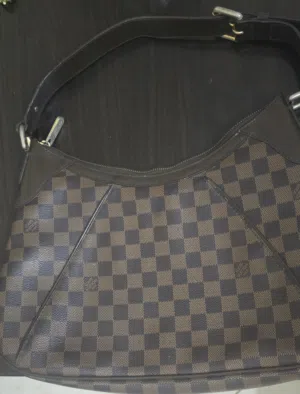 brown Louis Vuitton for sale  in Muharraq