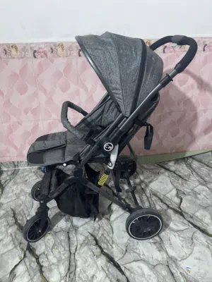 عربة أطفال جديده