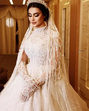 دار أزياء عبد بالوش  لفساتين الزفاف والهسرة فساتين اعراس صناعة يدوية بالكامل  شحن لكافة انحاء العالم