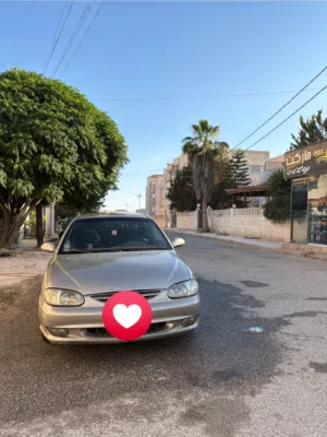 كيا تو 1999