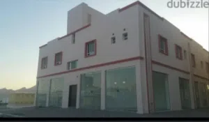 للبيع بناية تجارية في مسقط العامرات النهضة البريد جنب المحكمة مكونة من طابقين مؤجرة بالكامل