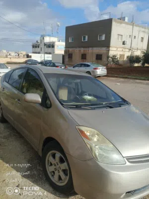 تويوتا بريوس 2005 مستعملة معروفة بمواصفات كوريا وبطاقة مرخصة شارة هايبرد