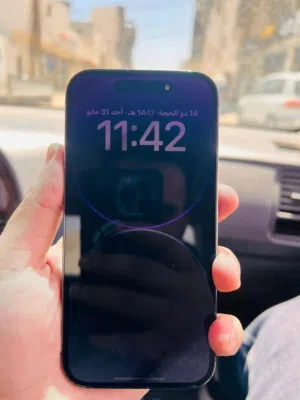 14 برو لون بنفسجي بحاله ممتازه 128 جيجا ..
