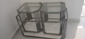 طقم طاولات ضيافة مودرن (1 كبيرة + 2 صغيرة) – هيكل حديد سلفر مع زجاج وقاعدة رخامية