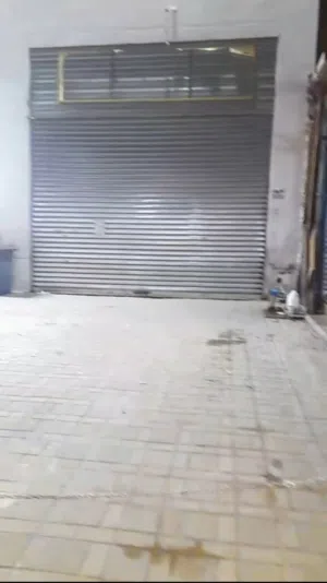كراج للايجار 100 متر +سندره على شارع رئيسي