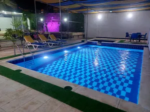 شاليه للإيجار اليومي شاليه ومزرعة تل الروضه مسبح مدفا مزارع وشاليهات للايجار بأفضل الأسعار .........