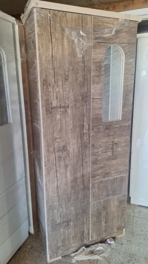ملابس دولاب بابين جديد لون ابيض او بني