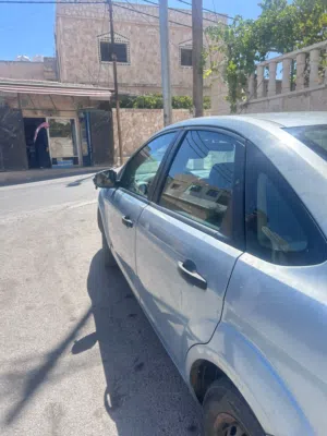 فورد فوكس 2009 لون سماوي  1600cc الفحص 3جيد