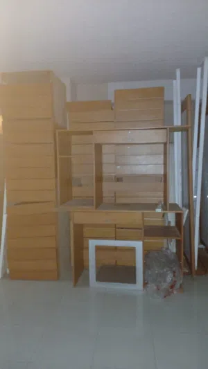 All-drawer cabinet with high wooden stands. Was previoulsy a pharmacy cabinet. Massif cherry wood.