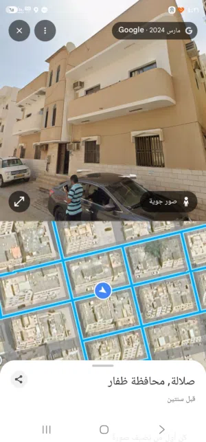 بناية في صلاله الوسطى بدخل شهري