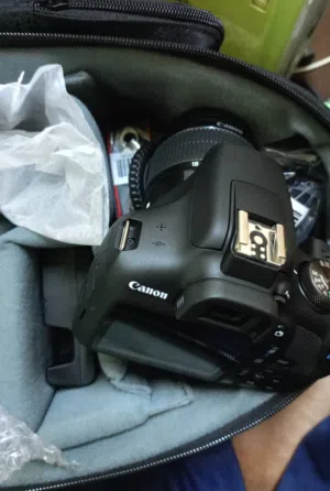 Hello, I am selling my Canon EOS 2000D DSLR camera, which comes with the versatile 18-55mm kit lens.