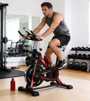 **دراجة تمرين ثابتة (Spin Bike / Studio Cycle)** بتصميم رياضي وعصري، وهي مثالية للتمارين المكثفة