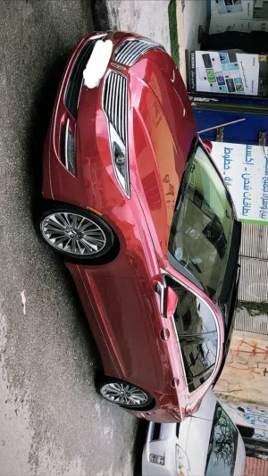 سيارة لينكولين موديل mkz موديل 2014 فحص 4 جيد ..ماشيه 100 الف بحالة الوكاله  بسعر 13600