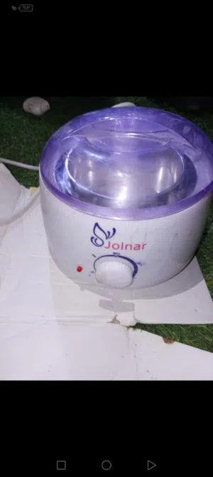 جهاز تسخين الشمع