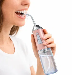 جهاز تنظيف الأسنان المائي المحمول (الخيط المائي)