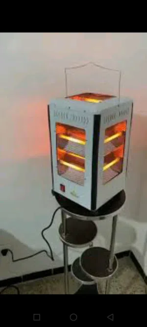 مدفأة + موقد طهي من الأعلى 2في1 .  2000W 5Fcd Révolte