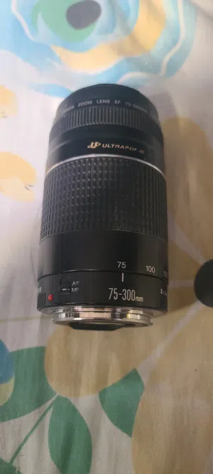 عدسه كانون 300-75