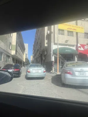 شقه للبيع بشارع عمر المختار بجوار فندق توباكتس