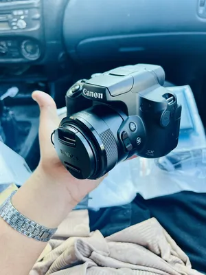 DSLR Cameras . Canon . New0