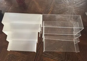 ستاندات اكريليك لعرض الاحذية و الشنط للبيع