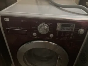 غساله   مع نشافه حماصه وشغاله أوتوماتيك LG