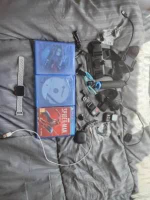 camera and Hawaii fit 3 and sondcore 7 Cd fifa23 Grand trismo 7 and spider man 1