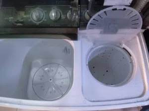 Washer and dryer machine cleaning clothes good condition company toshiba VH-7300B model